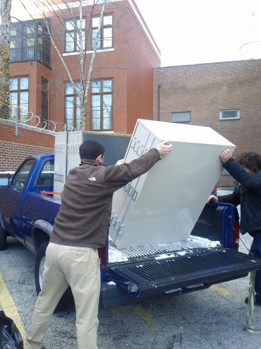 Loading the flatfiles onto the truck.