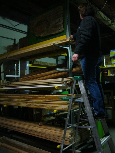 Dennis organizing the lumber racks, complete with the Simpatico donation.