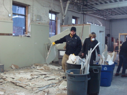 micahel and roberto clearing sheet rock