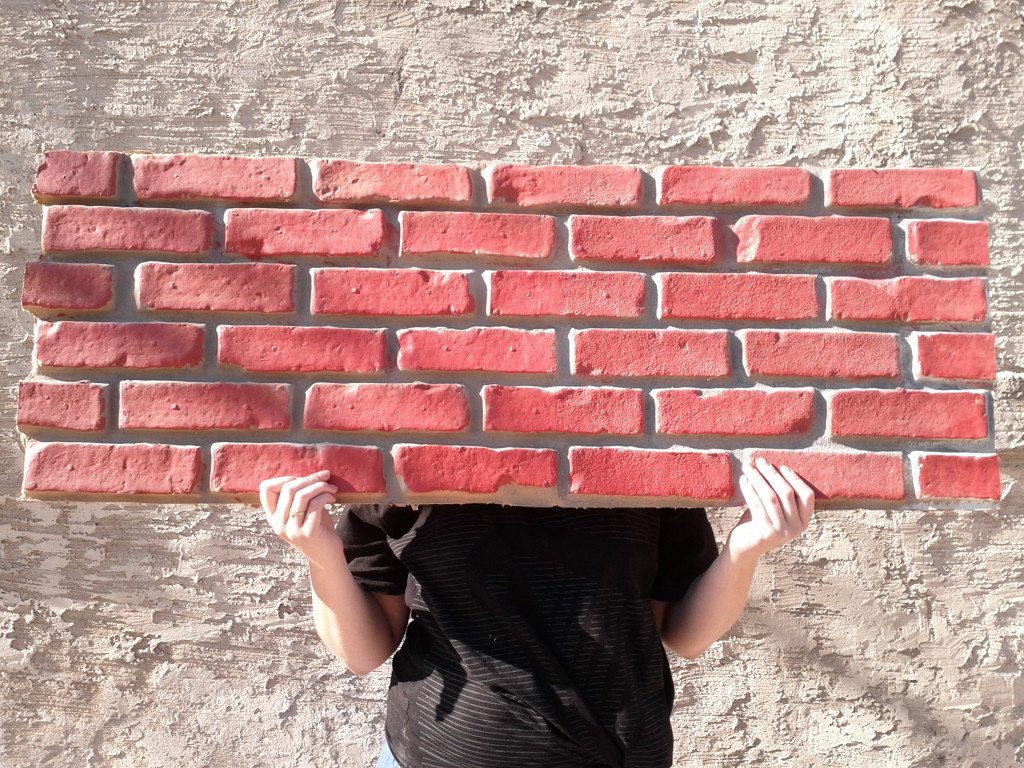Alison lifting brick wall!