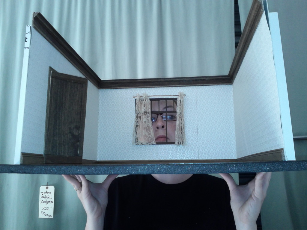 Alison looking through set house window