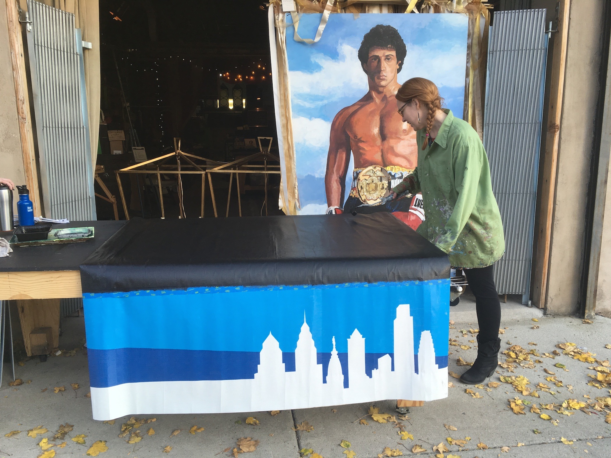 alison-painting-signs-outside