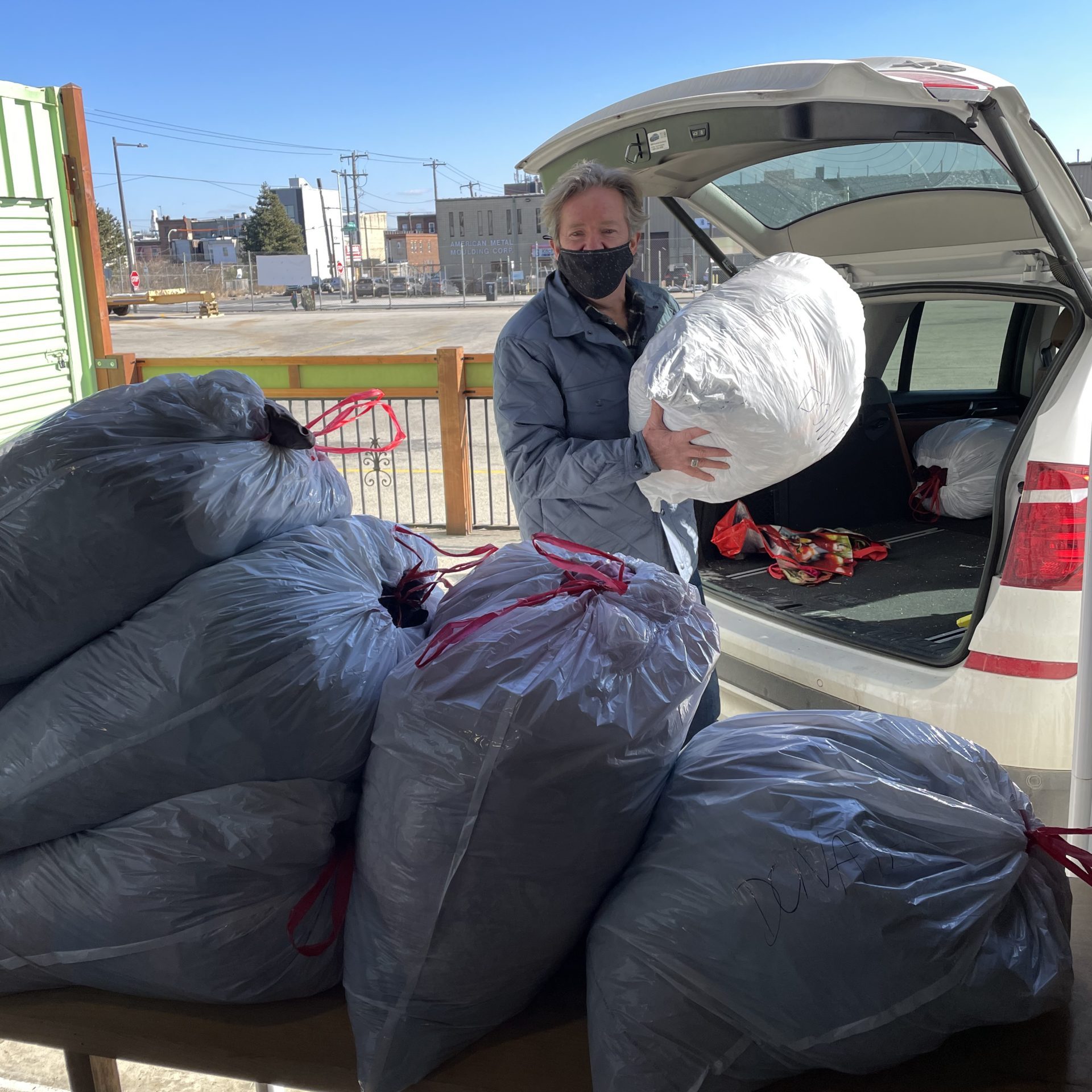 Kevin O'Brien unloading donations from car